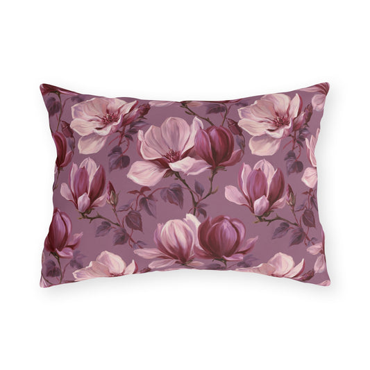 Blush and burgundy painted magnolias on mauve outdoor lumbar pillow