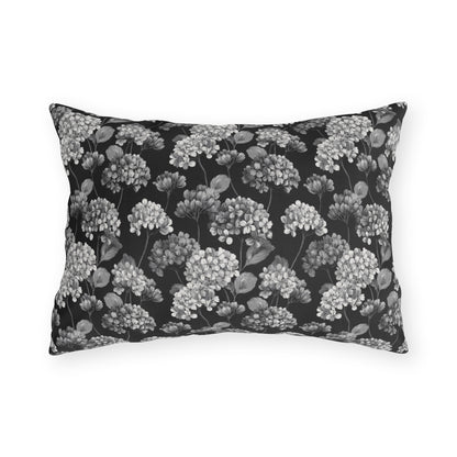 White and grey hydrangeas on black outdoor lumbar pillow