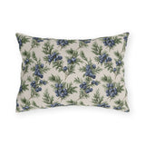 Blue juniper berries and green foliage on cream outdoor lumbar pillow