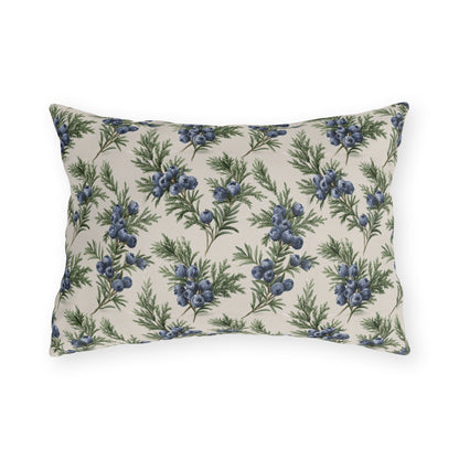 Blue juniper berries and green foliage on cream outdoor lumbar pillow