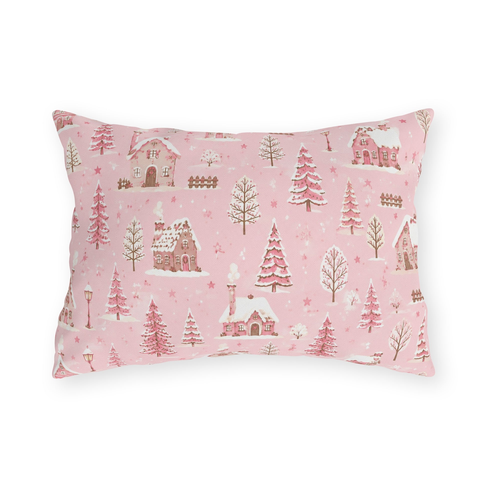 Snow-covered pink cottages and fir trees on pink outdoor lumbar pillow