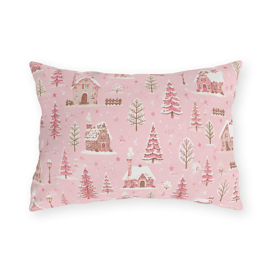 Snow-covered pink cottages and fir trees on pink outdoor lumbar pillow