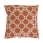 Terracotta Moroccan trellis outdoor pillow with a cream octagon lattice