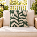 Green painted chevron outdoor pillow styled with matching pillows as a set