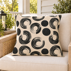 Oatmeal outdoor pillow with black brushed rings and dots, second view