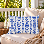 White outdoor lumbar pillow with vertical blue tulip and vine stripes, second view