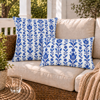 Vertical rows of cobalt tulips, leaves and small flowers on white