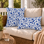 Cobalt tulips, berries and five-petal flowers scattered across white