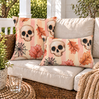 Pink skull and autumn leaf Halloween outdoor pillow and outdoor lumbar pillow styled together as a set