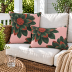 Pink and green dahlia floral outdoor pillow and outdoor lumbar pillow styled together as a set