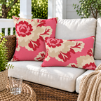 Pink and red peony floral outdoor pillow and outdoor lumbar pillow styled together as a set