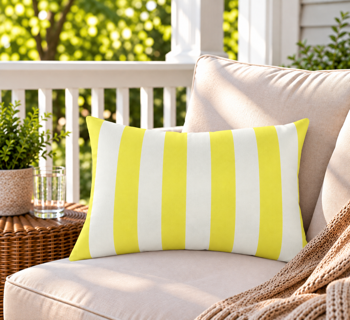 Yellow and cream striped outdoor lumbar pillow, second view