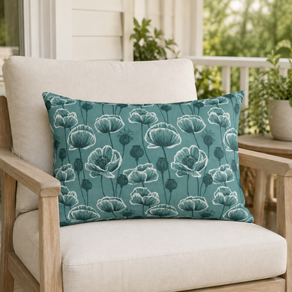 Teal and white poppies and seed heads on teal outdoor lumbar pillow