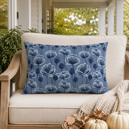 Navy and white poppies and seed heads on blue outdoor lumbar pillow