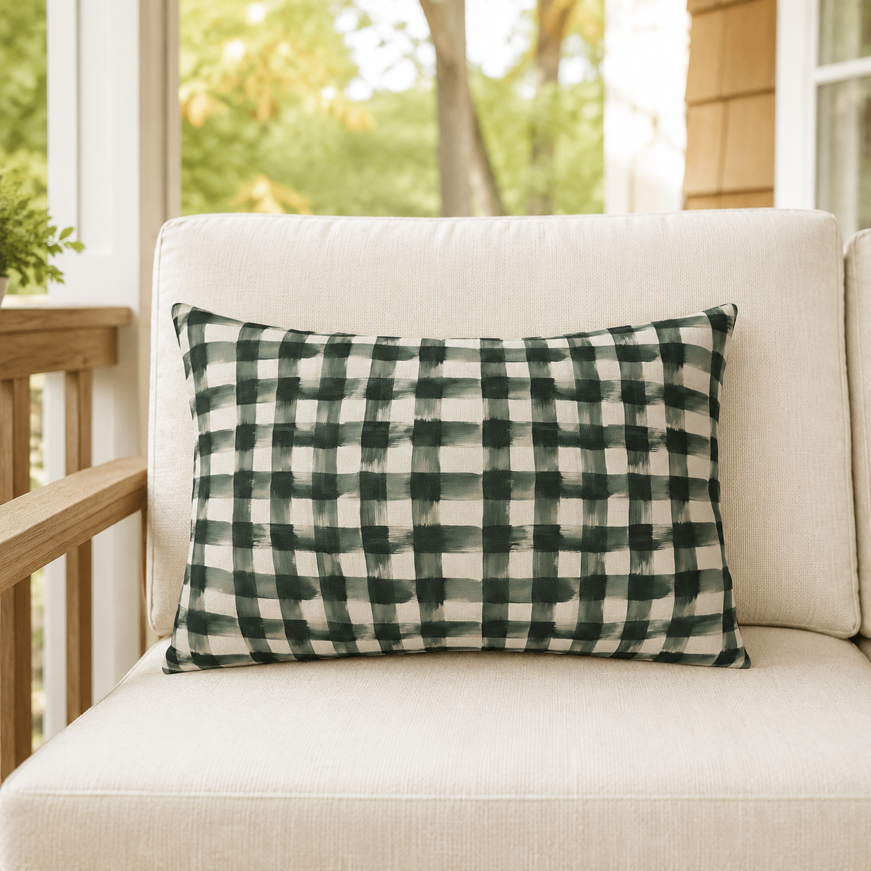 Hand-painted forest green gingham check on cream outdoor lumbar pillow