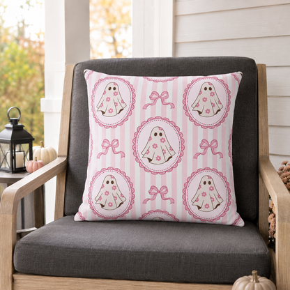 Pink cartoon ghosts in scalloped frames with bows on pink stripe outdoor pillow