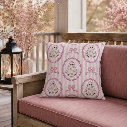 Pink cartoon ghosts in scalloped frames with bows on pink stripe outdoor pillow