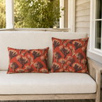 Cream and black sea coral branches on coral red outdoor lumbar pillow