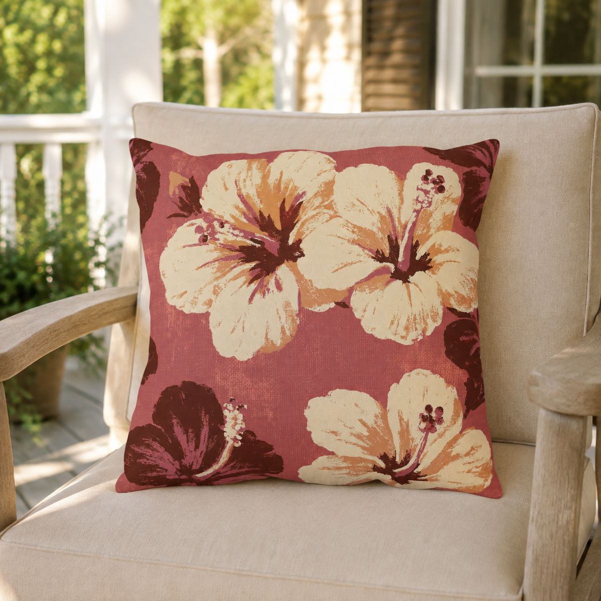 Dusty rose outdoor pillow with large painted hibiscus blooms, second view