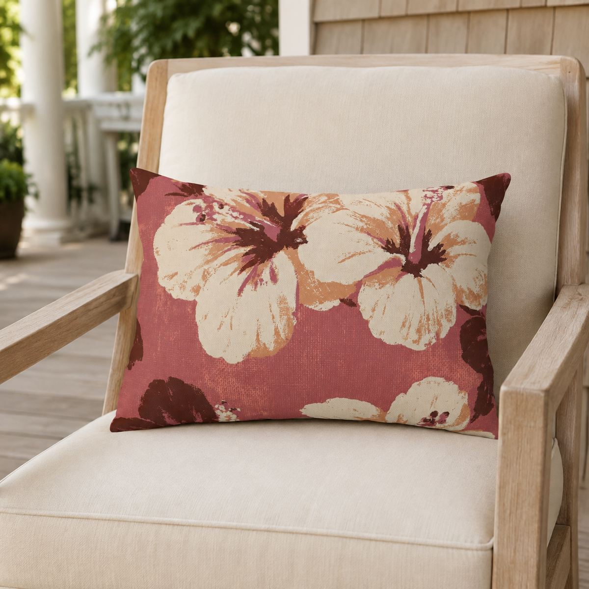 Dusty rose outdoor lumbar pillow with large painted hibiscus blooms, second view