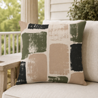 Cream outdoor pillow with olive and charcoal brushed blocks, second view