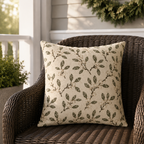 Cream outdoor pillow with olive leaves and snowberry sprigs, second view