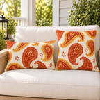 Rust and mustard paisley outdoor pillow and outdoor lumbar pillow styled together as a set