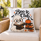 Boo-k Club ghost Halloween outdoor pillow styled on patio furniture