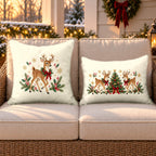 Cream Christmas reindeer outdoor pillow and outdoor lumbar pillow styled together as a set on a wicker loveseat for Christmas