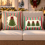Red stripe Christmas tree outdoor pillow and outdoor lumbar pillow styled together as a set on a wicker loveseat for Christmas