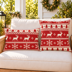 Red fair isle Christmas outdoor pillow and outdoor lumbar pillow styled together as a set on a porch loveseat