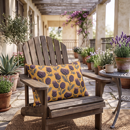 Deep plum artichoke thistles on warm ochre outdoor lumbar pillow