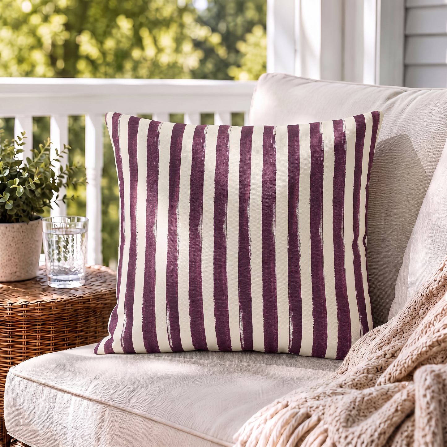 Hand-painted plum and cream vertical stripe outdoor pillow