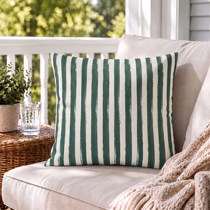 Hand-painted forest green and cream vertical stripe outdoor pillow