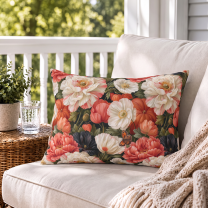 Coral red poppies, cream peonies and small pumpkins on near-black outdoor lumbar pillow