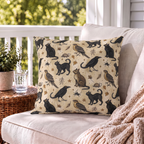 Black cat and raven outdoor pillow on parchment cream styled on a porch