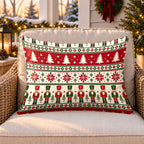 Red Nordic nutcracker outdoor lumbar pillow on a rattan chair on a Christmas porch