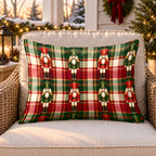 Red plaid nutcracker outdoor lumbar pillow on a rattan chair on a Christmas porch