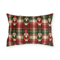 Christmas nutcracker outdoor lumbar pillow with small nutcracker soldiers on red, green and cream tartan plaid