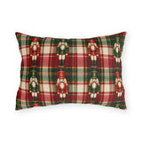 Christmas nutcracker outdoor lumbar pillow with small nutcracker soldiers on red, green and cream tartan plaid