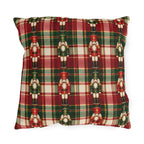 Christmas nutcracker outdoor pillow with small nutcracker soldiers on red, green and cream tartan plaid
