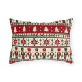 Nordic Christmas nutcracker outdoor lumbar pillow with graphic bands of nutcrackers, pine trees and snowflakes in red, green and cream