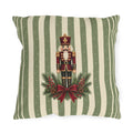 Sage green Christmas nutcracker outdoor pillow with a nutcracker, pine and a burgundy ribbon on sage and cream stripes