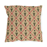 Christmas nutcracker outdoor pillow with a cranberry diamond lattice and green nutcrackers on tan