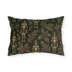 Gold and green Christmas nutcracker outdoor lumbar pillow with gold nutcrackers, holly and pine on forest green