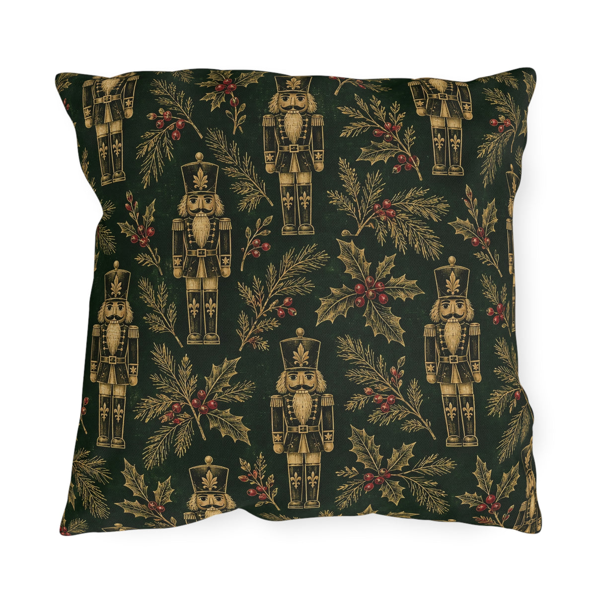 Gold and green Christmas nutcracker outdoor pillow with gold nutcrackers, holly and pine on forest green