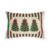 Vintage Christmas tree outdoor lumbar pillow with a lit fir tree and red bow in a cream panel on red, green and cream stripes