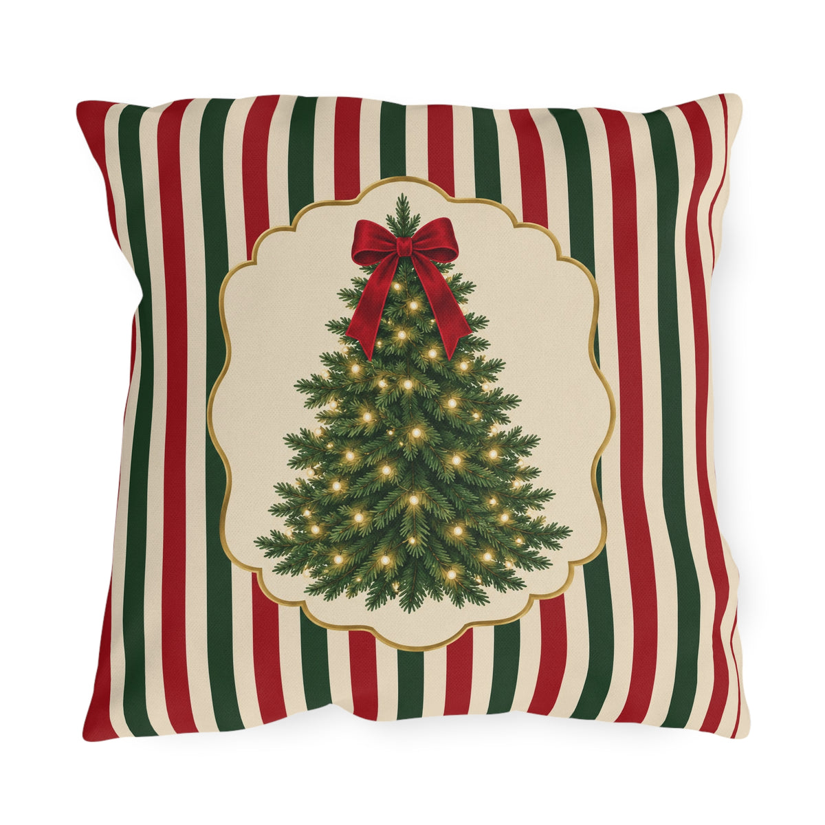 Vintage Christmas tree outdoor pillow with a lit fir tree and red bow in a cream panel on red, green and cream stripes