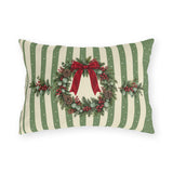 Sage green Christmas wreath outdoor lumbar pillow with a pine and berry wreath and red ribbon on sage and cream stripes