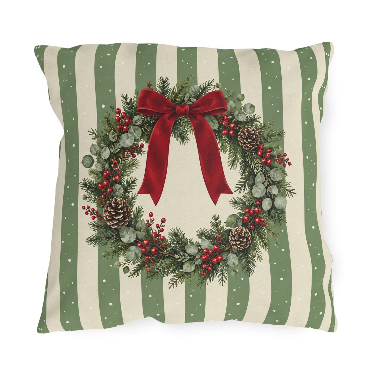Sage green Christmas wreath outdoor pillow with a pine and berry wreath and red ribbon on sage and cream stripes